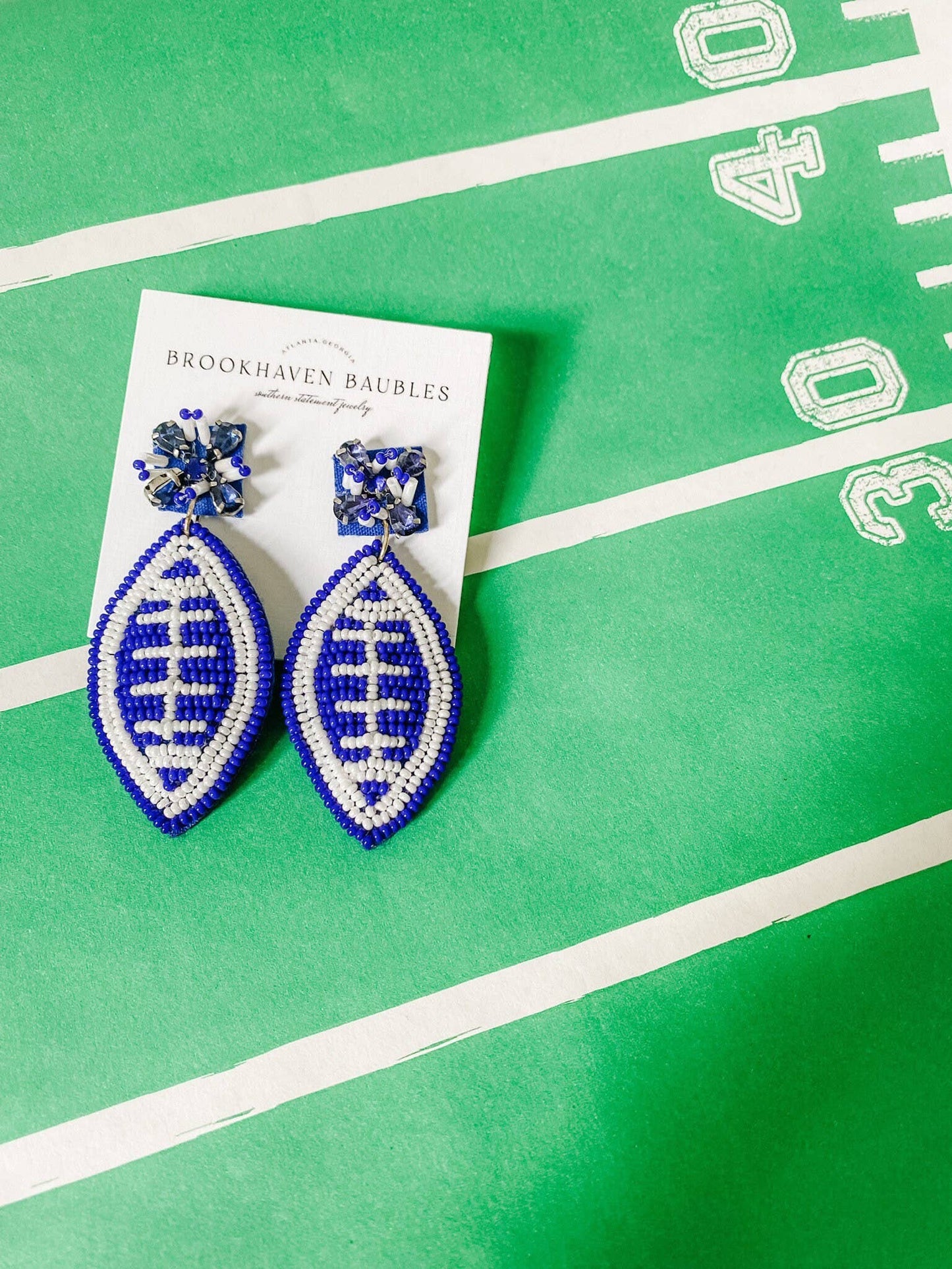 Blue and White Football Beaded Statement Earrings